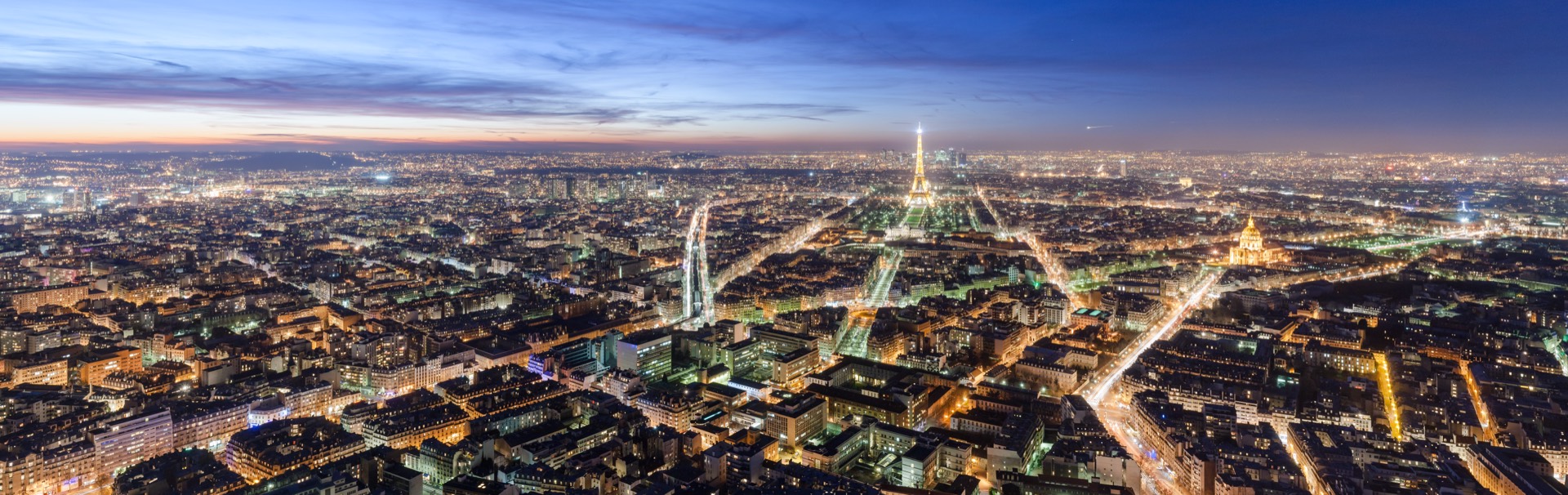 Eiffel Tower over the rooftops of Paris, France